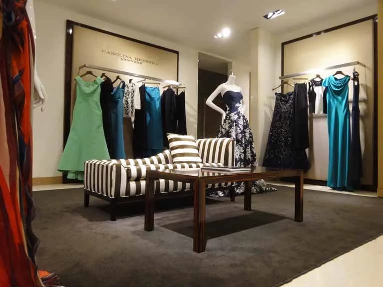 51 East womenswear section with upholstered bench seating
