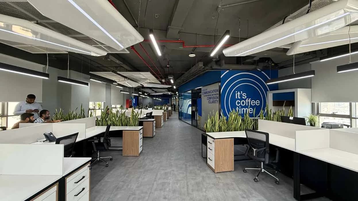 Bayanat Engineering open plan workspace with custom made desking