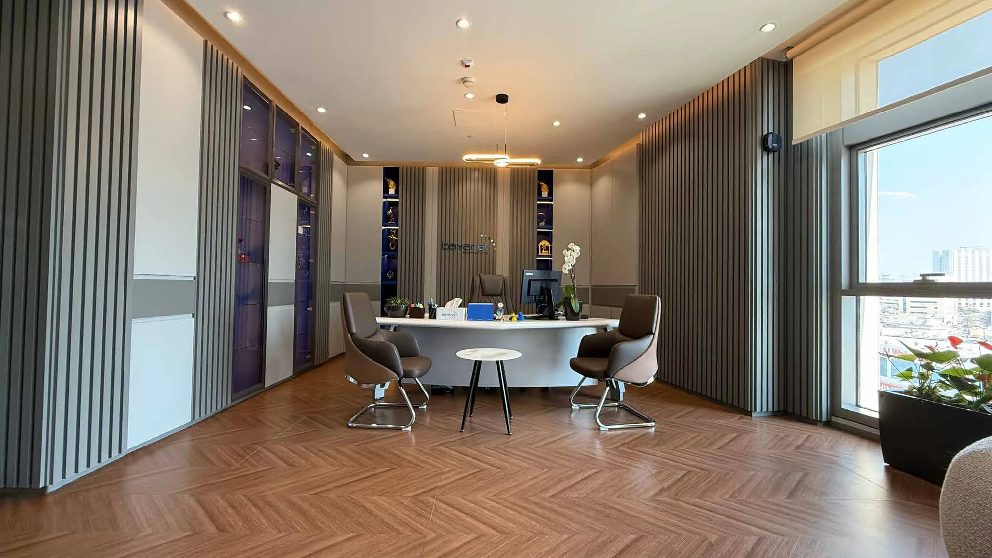 Bayanat Engineering meeting room with herringbone flooring and city views