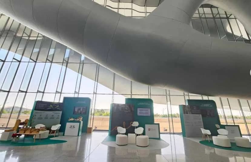 DIFI 2024 partner pods and seating along the QNCC concourse