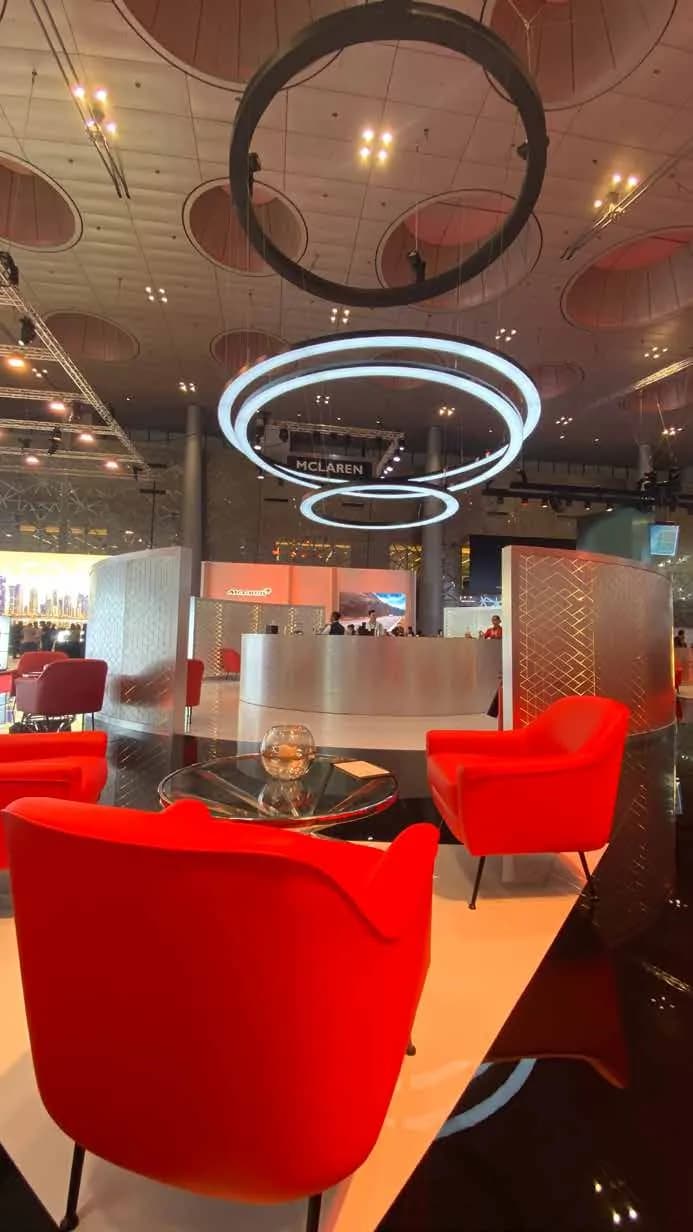 GIMS bar counter with ring chandelier above