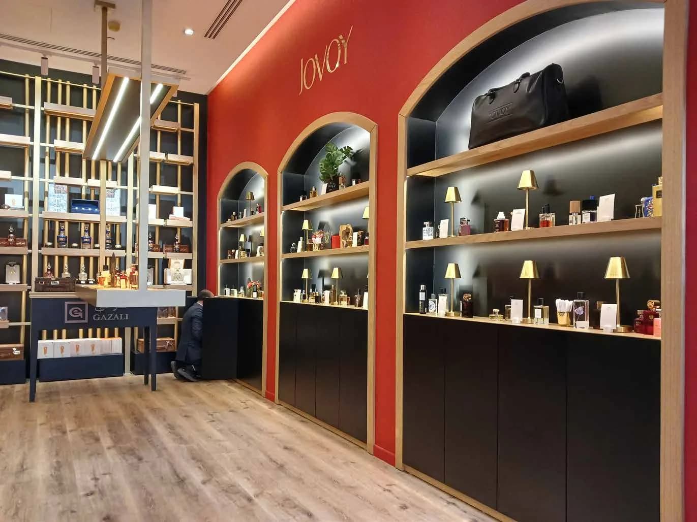 Jovoy interior with arched niches and timber shelving