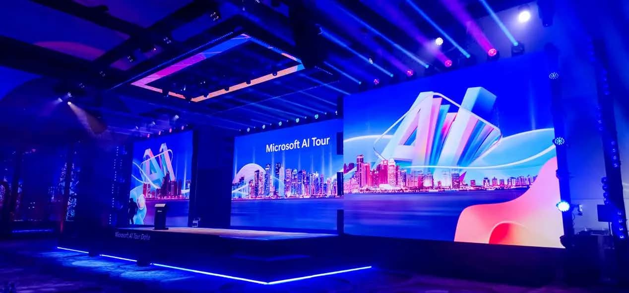 Microsoft AI Tour main stage with wide curved LED backdrop