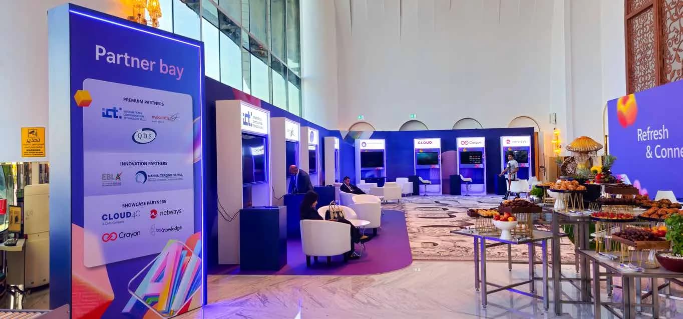 Microsoft AI Tour partner bay with exhibitor pods and refreshment counters