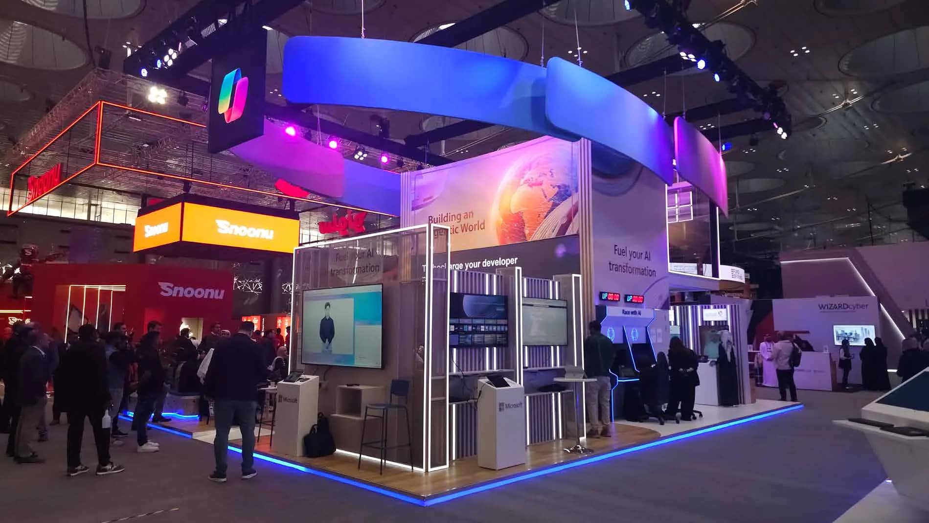 Microsoft Web Summit stand with hero demo section and partner pods