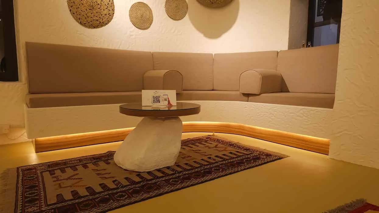 Najla Perfumes seating alcove with sculpted plaster walls
