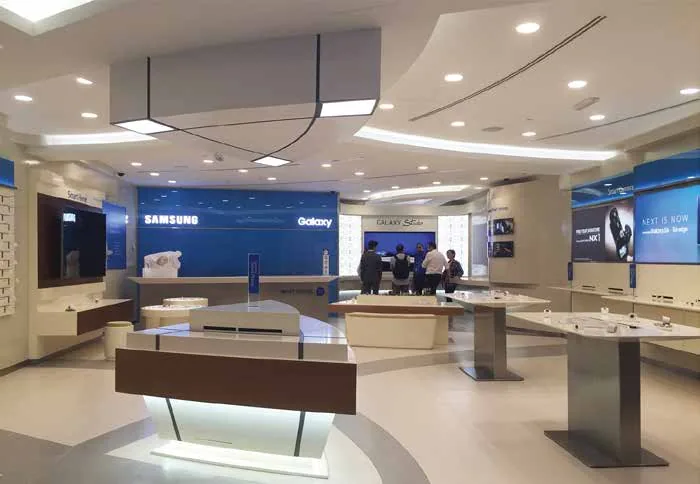 Samsung experience store at Qatar Duty Free with backlit display walls
