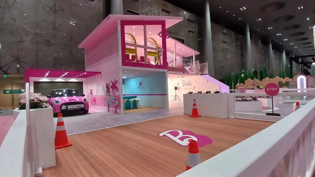 Barbie activation with a pink dolls house and photo set