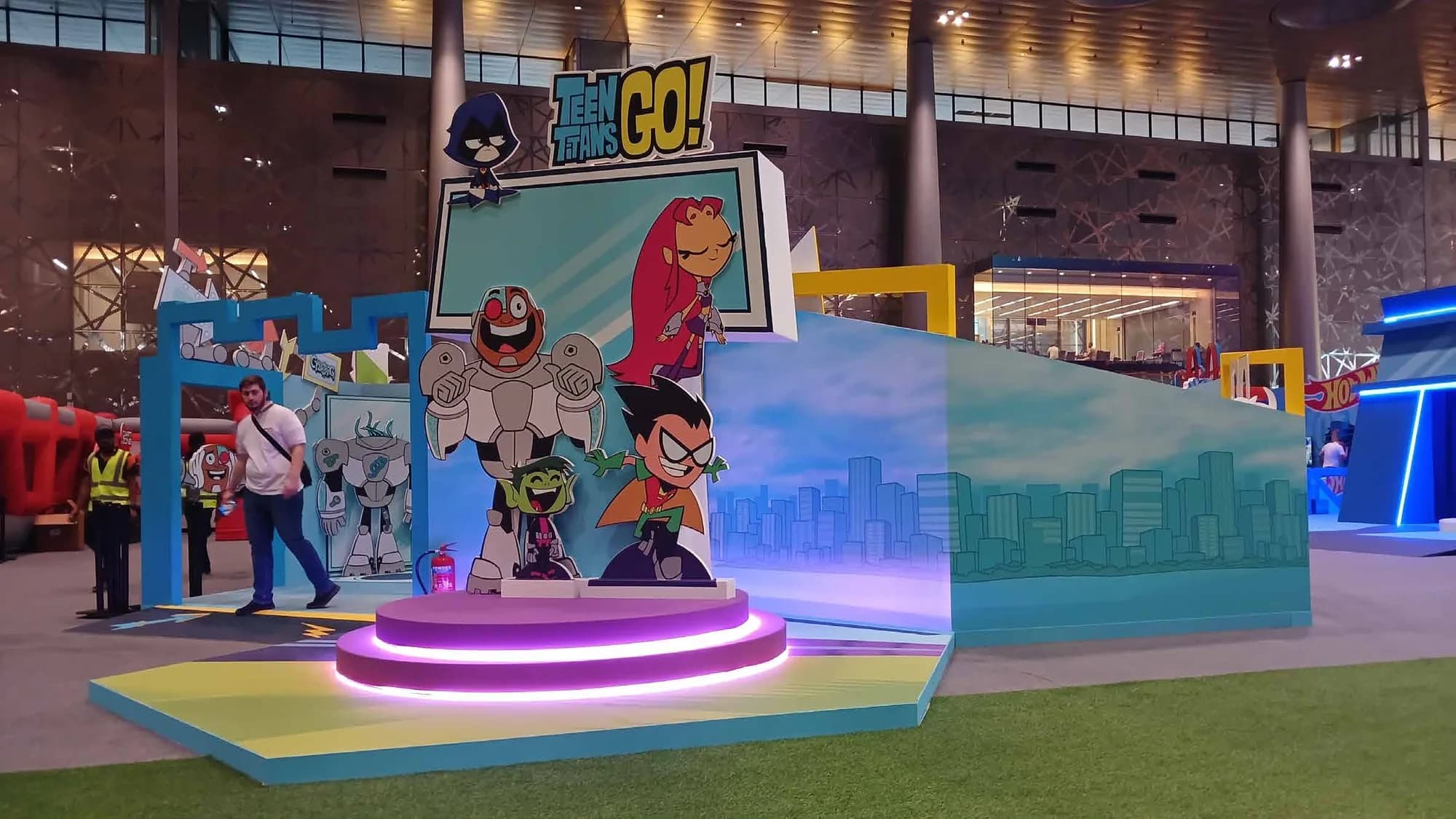 Teen Titans Go! activation with character cutouts and stage podium