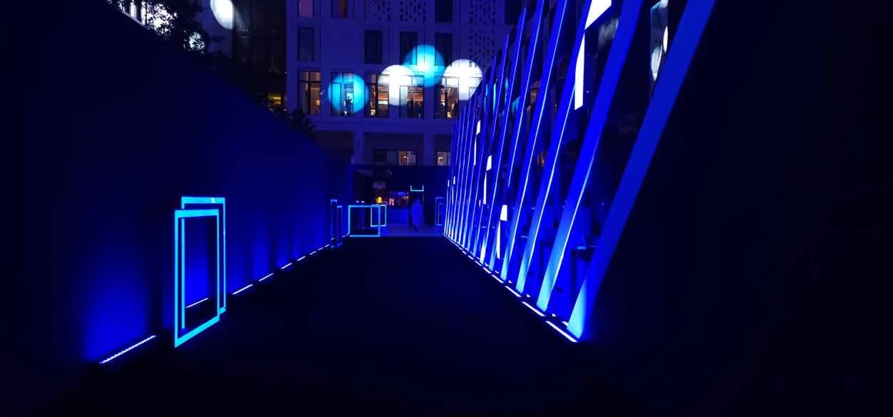 Illuminated entrance tunnel before the Rayan Bank identity reveal