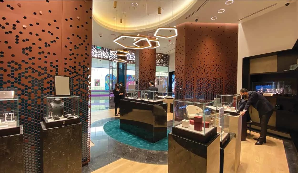 WAJ boutique with perforated bronze wall cladding and display islands