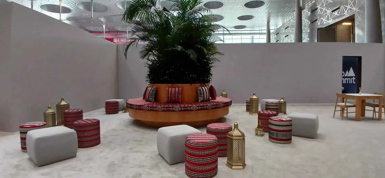 Central planted feature and stools in the Web Summit 2025 lounge